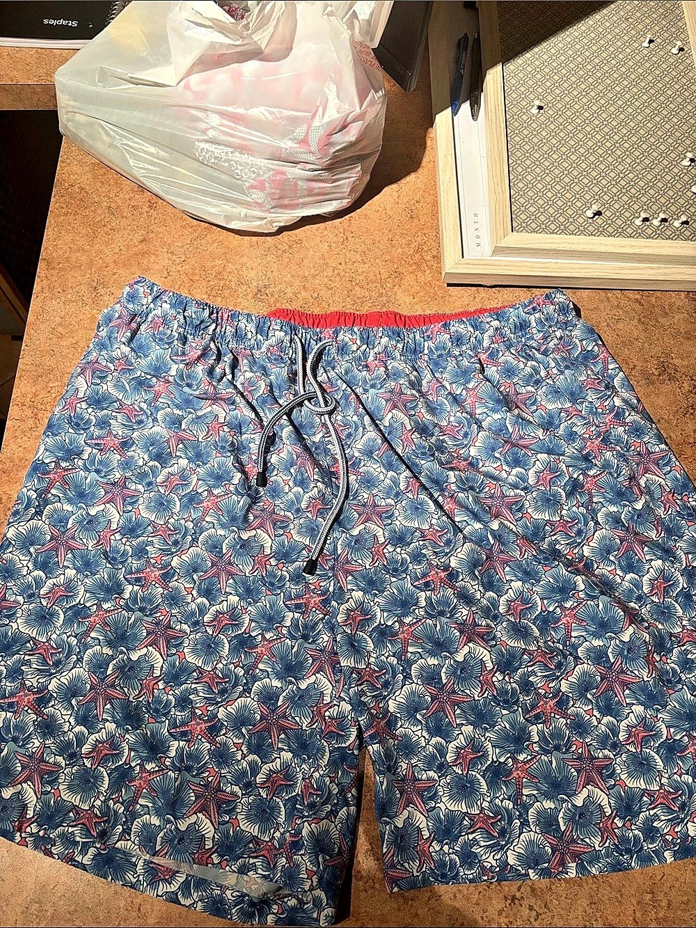 Starfish, blue and pink style, Peter Millar swim trunks